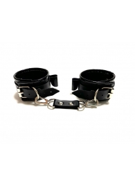 Черные наручники с бантиками из эко-кожи - БДСМ Арсенал - купить с доставкой в Краснодаре