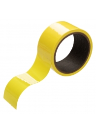 Желтый скотч для связывания Bondage Tape - 18 м. - California Exotic Novelties - купить с доставкой в Краснодаре