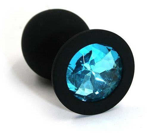 Чёрная силиконовая анальная пробка с голубым кристаллом - 7 см. - Kanikule - купить с доставкой в Краснодаре